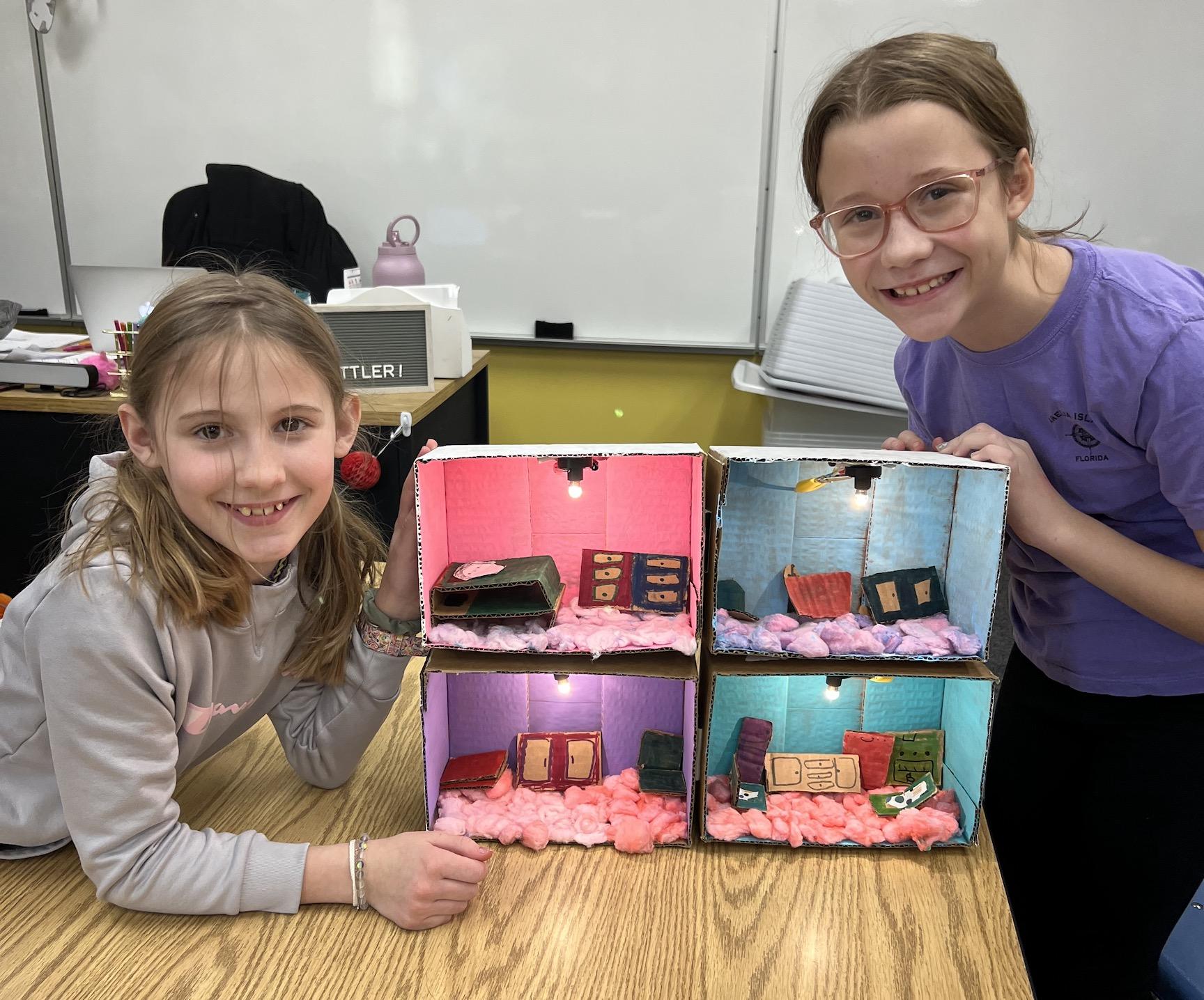 Sophia Bradley and Sophia Kuretich display their finished project